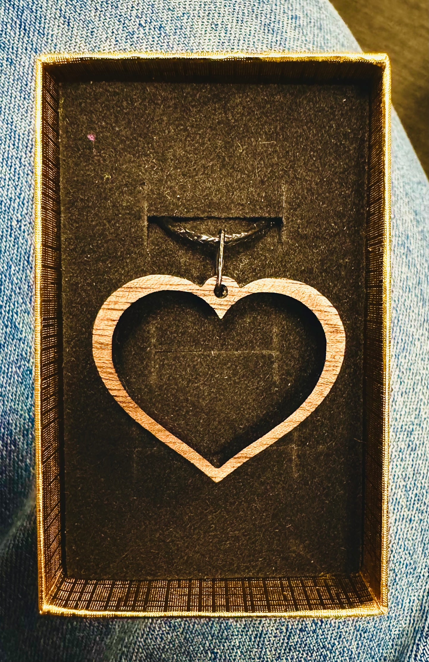 Open Heart Pendant made from walnut on a 20" cord.